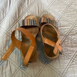 Palladium wedges with African print and leather straps